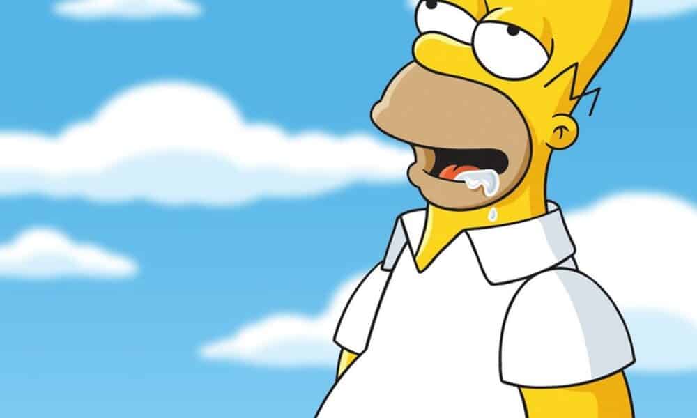 Homer Simpson drooling while singing 'Happy Birthday' awkwardly.