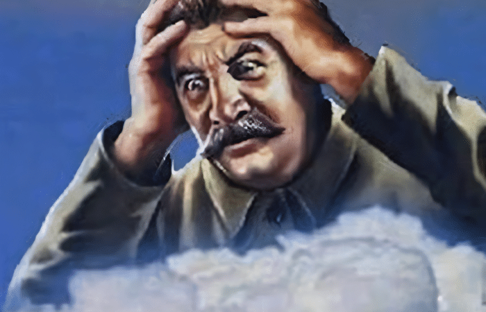 A dramatic man in uniform holds his head with both hands, captioned 'Happy Birthday Comrade Wishing You the Best, Bro.'
