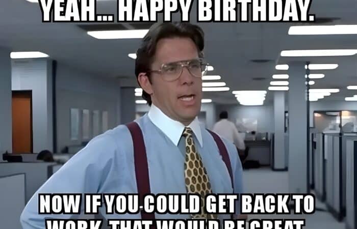 A manager in an office says, 'Yeah... happy birthday. Now if you could get back to work, that would be great.'